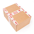 Obrázek Krabice zalepená lepicí páskou FRAGILE/křehké